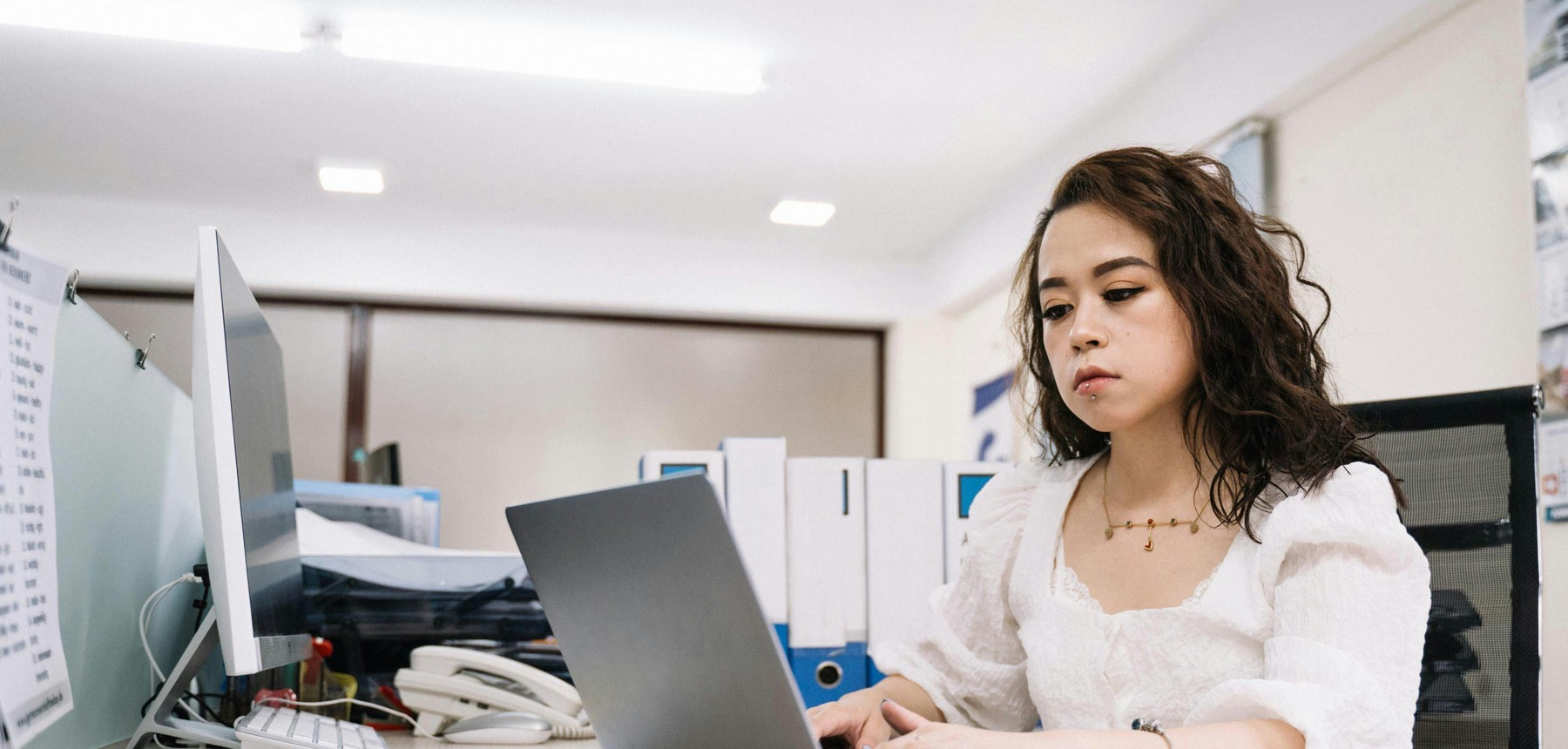 Filipino professionals collaborating in a modern office